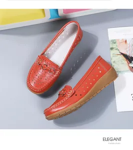 Ademende oranje loafers met sleehak voor dames, casual platte mocassins met gaatjes.