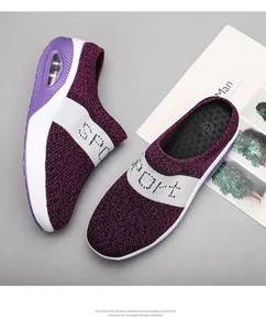 Macro view of purple knitted upper and thick cushioned EVA platform sole for women