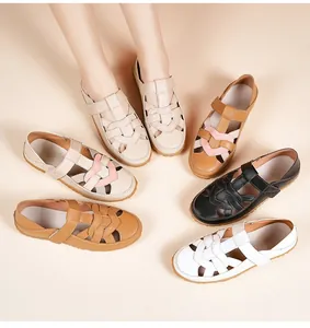 Detailed view showing various colored women's woven summer flat sandals with soft soles