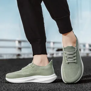 Breathable wide-toe men's running shoes with green knit mesh and thick cushioned white sole