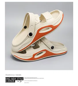 Detail view of men's beige and orange sports sandals with thick non-slip soles