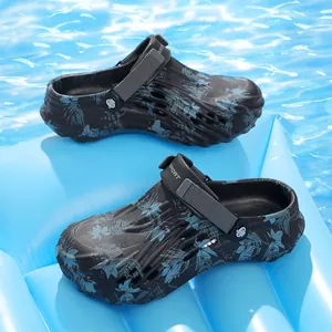 Men's stylish floral print garden clogs with wavy texture on a blue pool float surface
