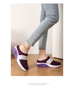 Close-up view of women's breathable fly-knit mules with thick EVA air bubble sole