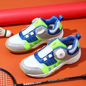 Professional kids badminton shoes featuring breathable mesh and a rotating dial buckle closure