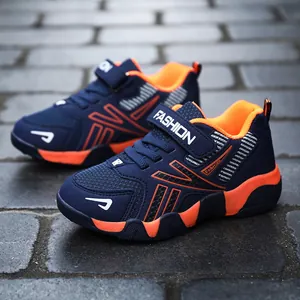 Detailed view of navy blue and orange breathable mesh sneakers for boys' outdoor sports
