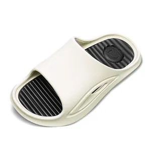 Fashionable sporty non-slip slide sandals in cream and black for outdoor and home beach use