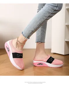 Pink breathable mesh mules with platform air-cushioned sole and 'SPORT' strap detail