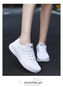 Close-up of white breathable flyknit running shoes for casual outdoor wear