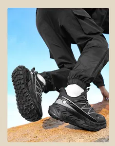 Detailed action view of black men's safety shoes with chunky EVA sole for outdoor work