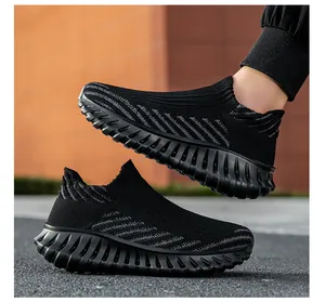 Breathable black knit slip-on sneakers for men and women, perfect for running or walking