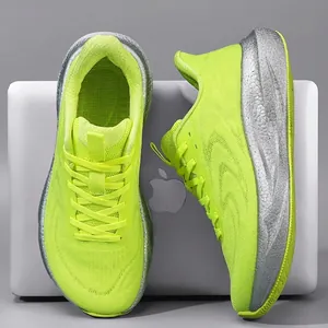 Neon green fly-knit running shoes with silver cushioning sole shown on a laptop