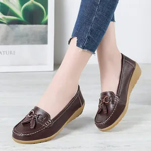 Comfortable dark brown leather loafers for women with soft soles and tassel details