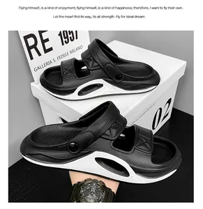Close-up of black and white men's casual sandals with a two-way wearable strap design.