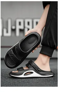 Close-up of black men's sports sandals with dual-wear heel strap and white details