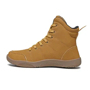 Vista laterale di scarpe da trekking a piedi nudi in pelle giallo senape a punta larga