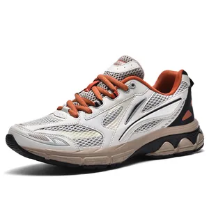 Retro ademende mesh chunky sneakers met dikke zool in wit en oranje voor vrijetijd
