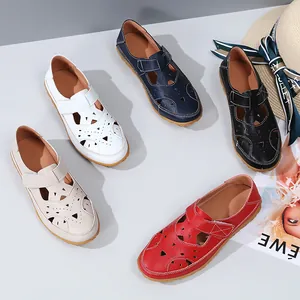 Flat hollowed-out beach sandals for women in multiple colors with hook-and-loop straps