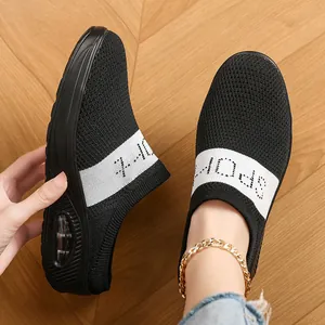 Women's breathable black knit platform clog sneakers with white sport band detail