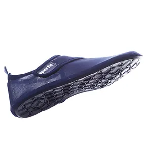 Close-up of blue mesh beach water shoe sole showing non-slip drainage grip pattern