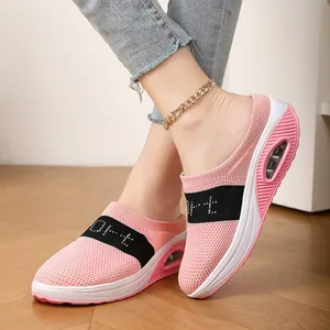Women's pink and black fly-knit mesh mule sneakers with comfortable thick air cushion soles