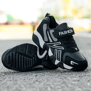 Durable black leather and mesh sports sneakers for boys with adjustable velcro straps