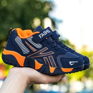 Breathable navy and orange children's running shoes with adjustable Velcro straps