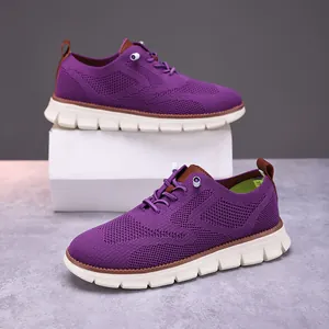 Detailed side view of purple breathable fly-knit casual shoes with white platform soles