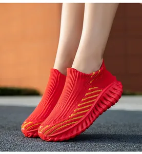 Vibrant red breathable fly-knit slip-on sneakers for running and walking comfortably.