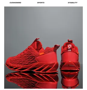 Close-up of red breathable knit mesh men's running shoes with blade sole design