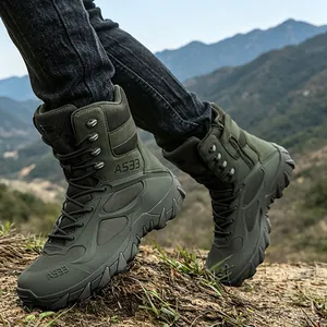 Rugged army green tactical combat boots for outdoor hiking and professional training.