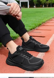 Men's breathable black mesh athletic sneakers shown on running track