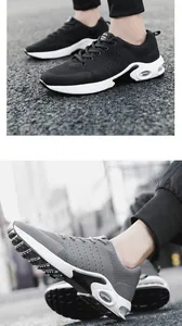 Close-up detail of black and grey flying knit men's sports sneakers with elevated soles