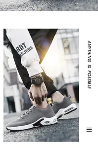Grey fly-knit breathable men's sports sneakers for urban running and everyday casual wear
