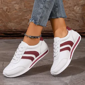 Women's white and burgundy lace-up casual sneakers with flat anti-slip sole for sports