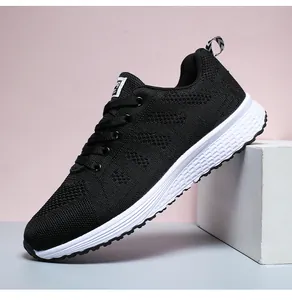Lightweight black fly-knit sports sneaker for women and men with white thick sole