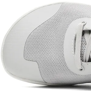 Close-up detail showing the breathable knit texture of wide-toe barefoot sneakers