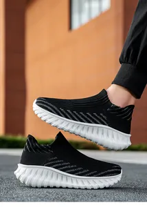 Black fly-woven slip-on sports shoes with a comfortable white cushioning sole