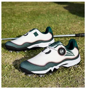 Professional men's waterproof golf shoes with rotating knob and spikes on grass