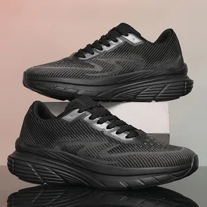 Close-up of breathable black fly-woven wide-width running shoes for men with thick soles.