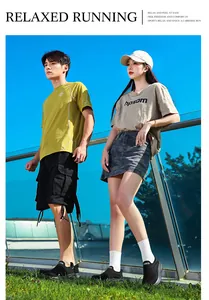 Outdoor lifestyle shot of comfortable black slip-on walking shoes for men and women