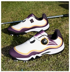 Close-up detail of purple and white waterproof golf shoes with rotary knob system