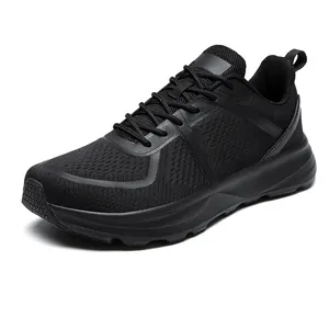 Close-up detail of men's wide toe box running shoe featuring breathable black mesh upper