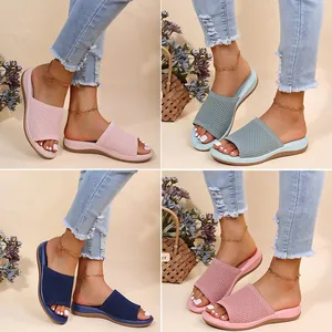 Women's knit platform slide sandals in multiple colors for summer beach wear and casual style.