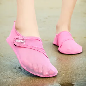 Detail view of pink breathable mesh water shoes for beach swimming and outdoor sports
