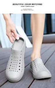 Close-up of grey perforated outdoor clogs showing breathable design and soft texture.