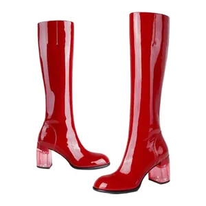 Elegant red patent leather knee-high boots with transparent glitter block heels