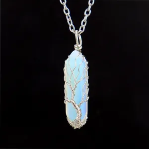 Detailed view of handmade tree of life wire wrapped opalite crystal pillar necklace