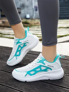 White and teal breathable mesh running sneakers for outdoor activities and daily wear