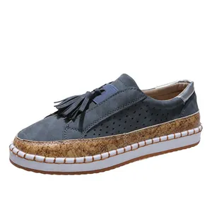 Mocassins bleus décontractés avec glands décoratifs et bordure à motif de liège