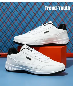 White synthetic leather men's sneakers with waterproof tag detail and black accents